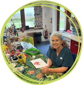 Suzanne in the messy play room at Little Harbour